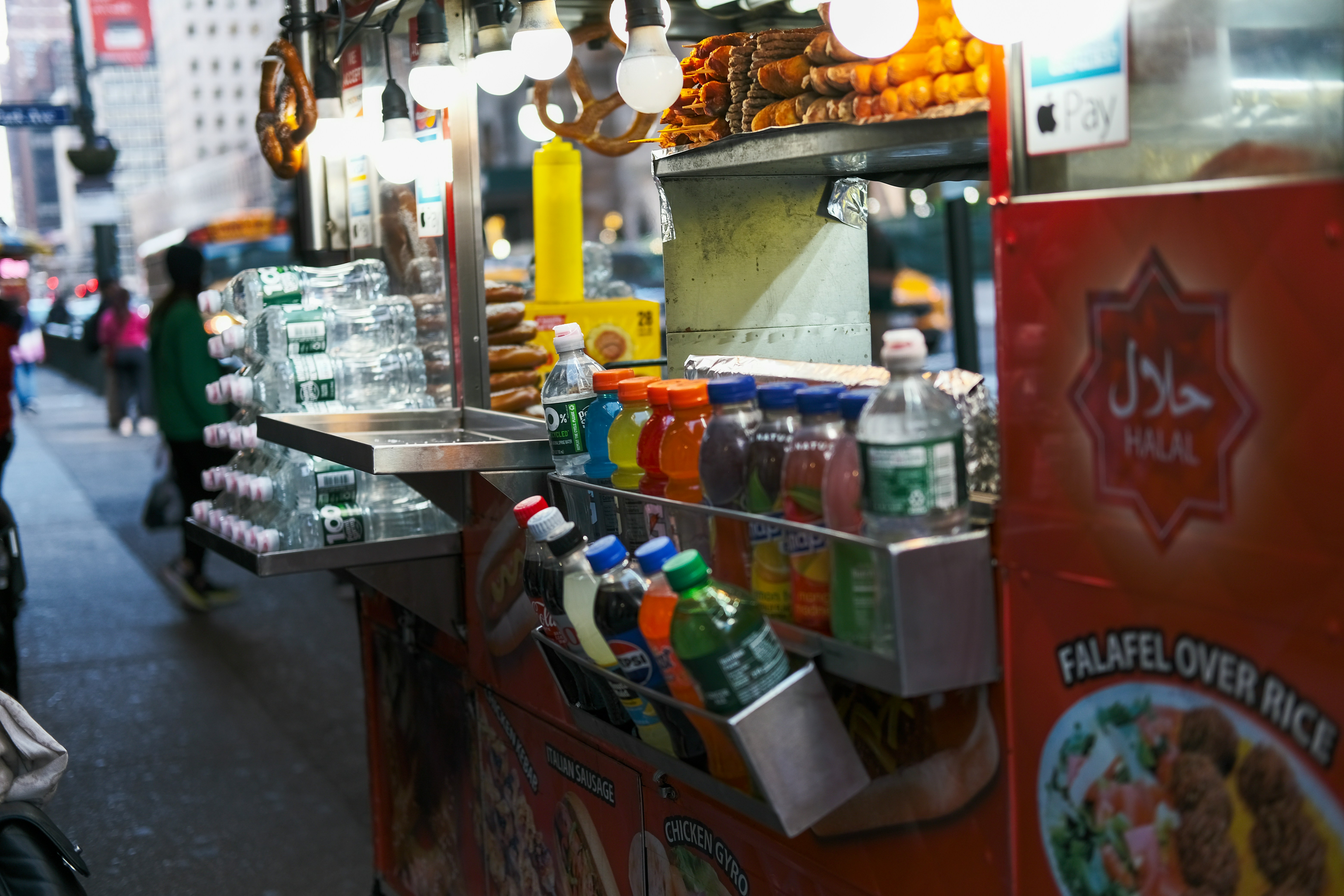 A food stand on the side of a street