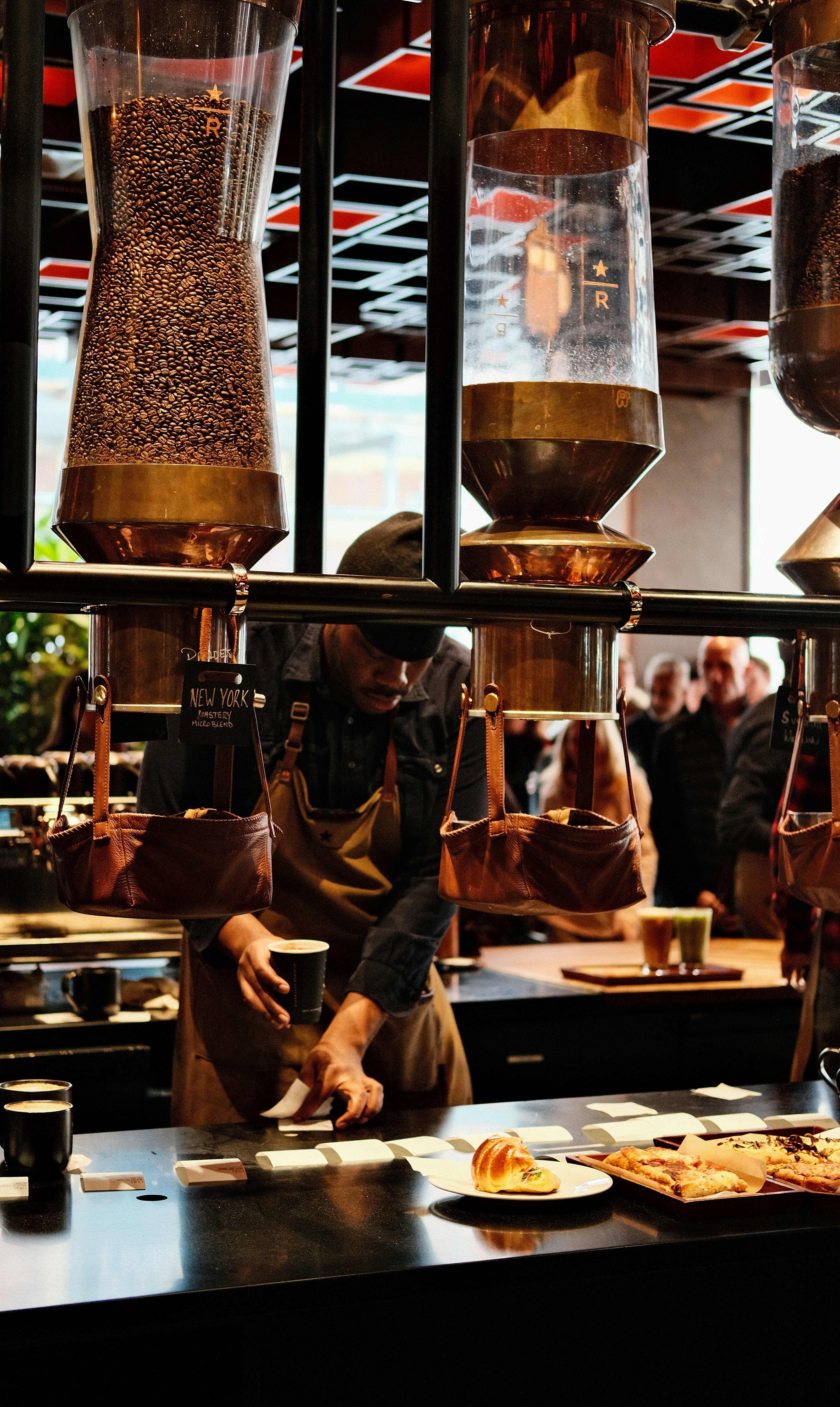 A group of people in a kitchen preparing food
