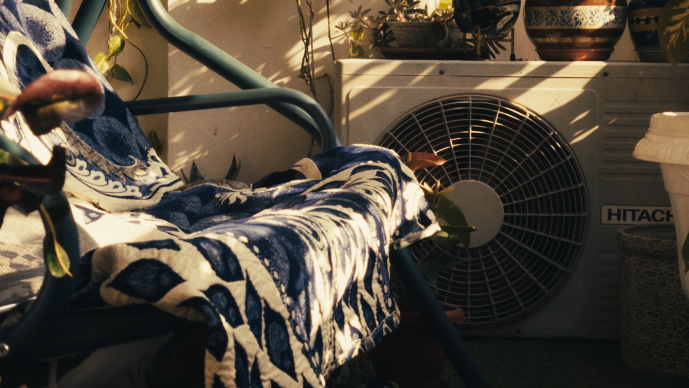 Outdoor HVAC condenser unit for residential air conditioning