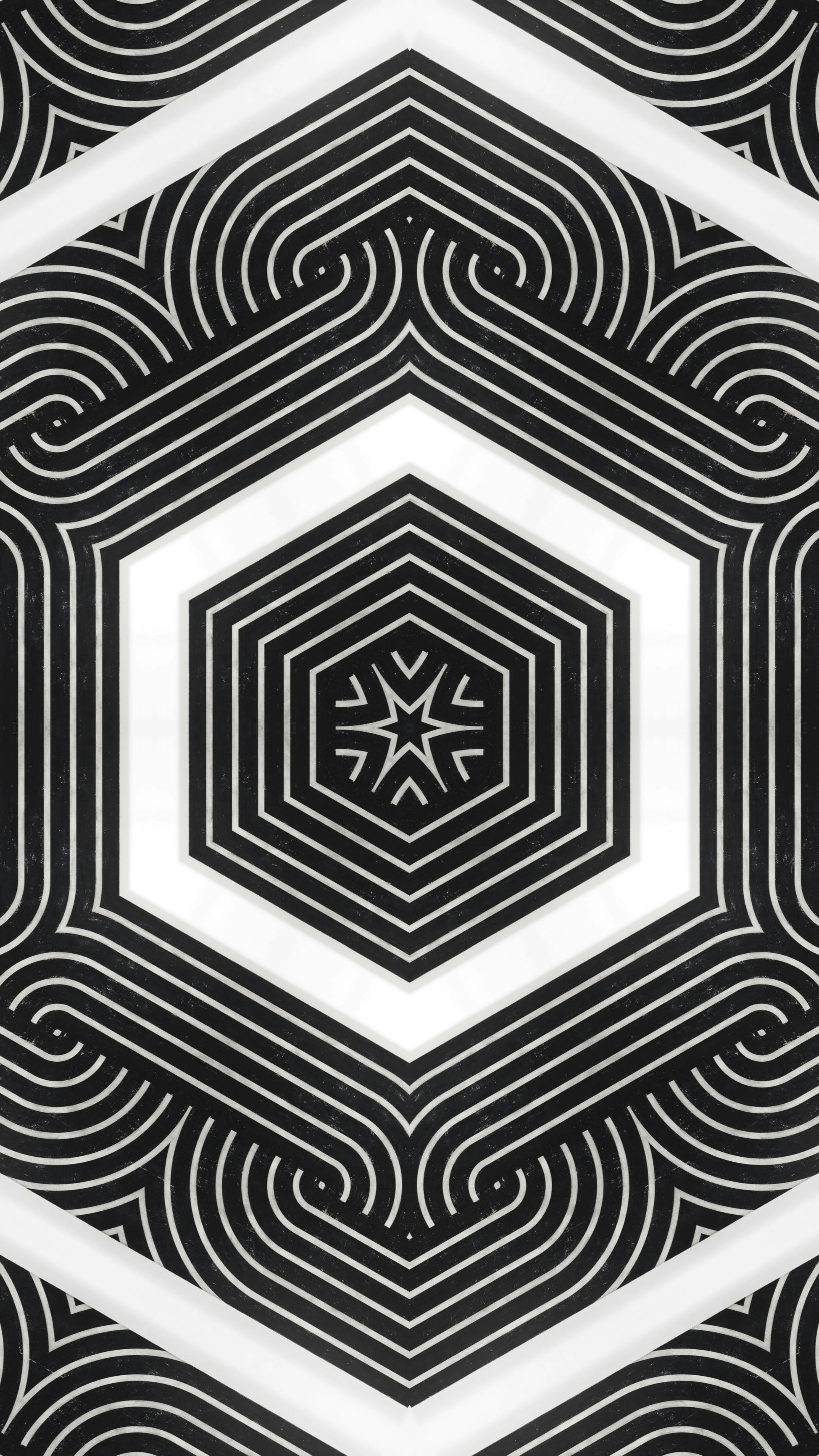 A black and white pattern with a hexagonal design