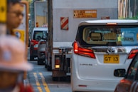 A city street filled with lots of traffic