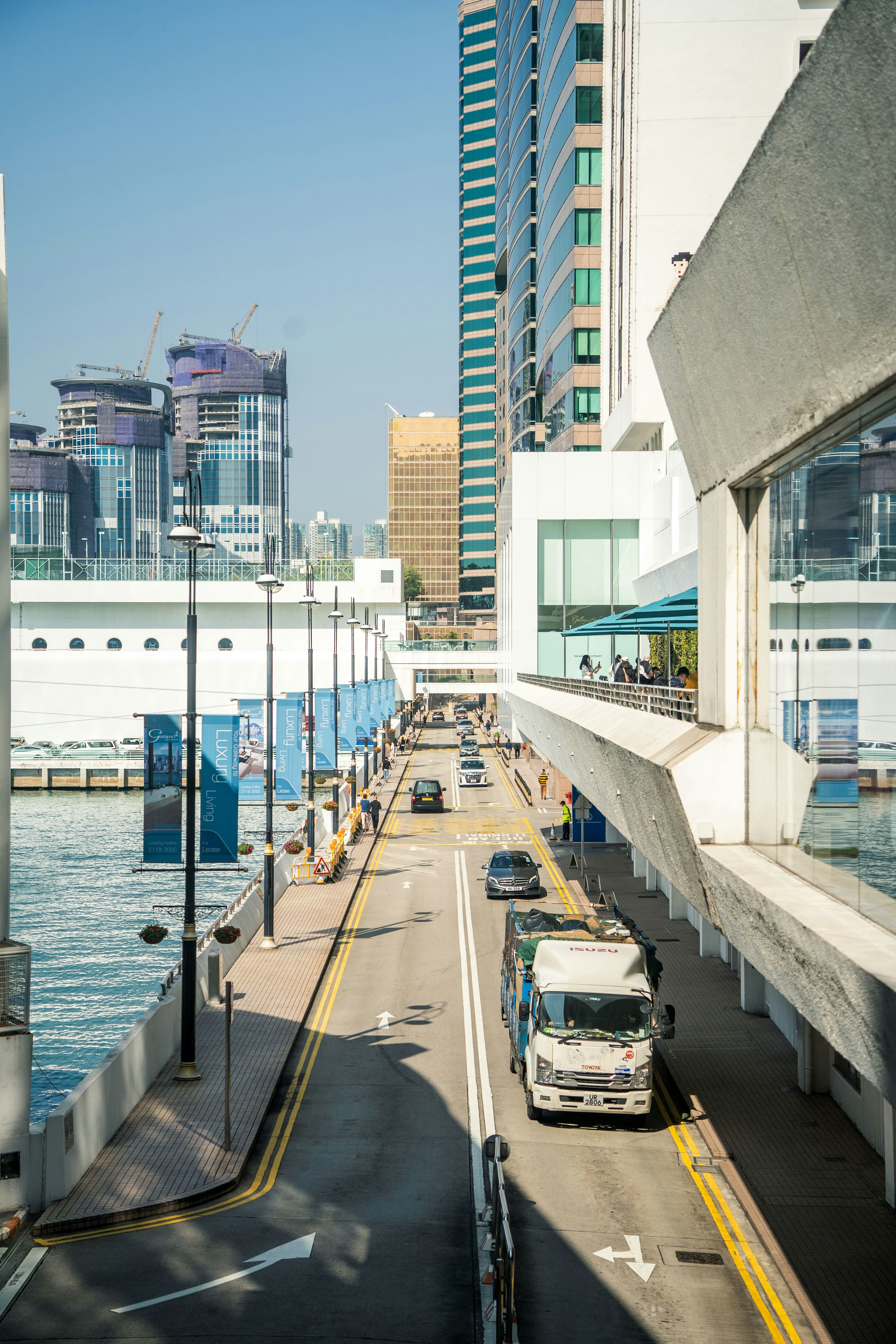 A city street with cars parked on the side of it