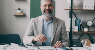 A man sitting at a desk in an office