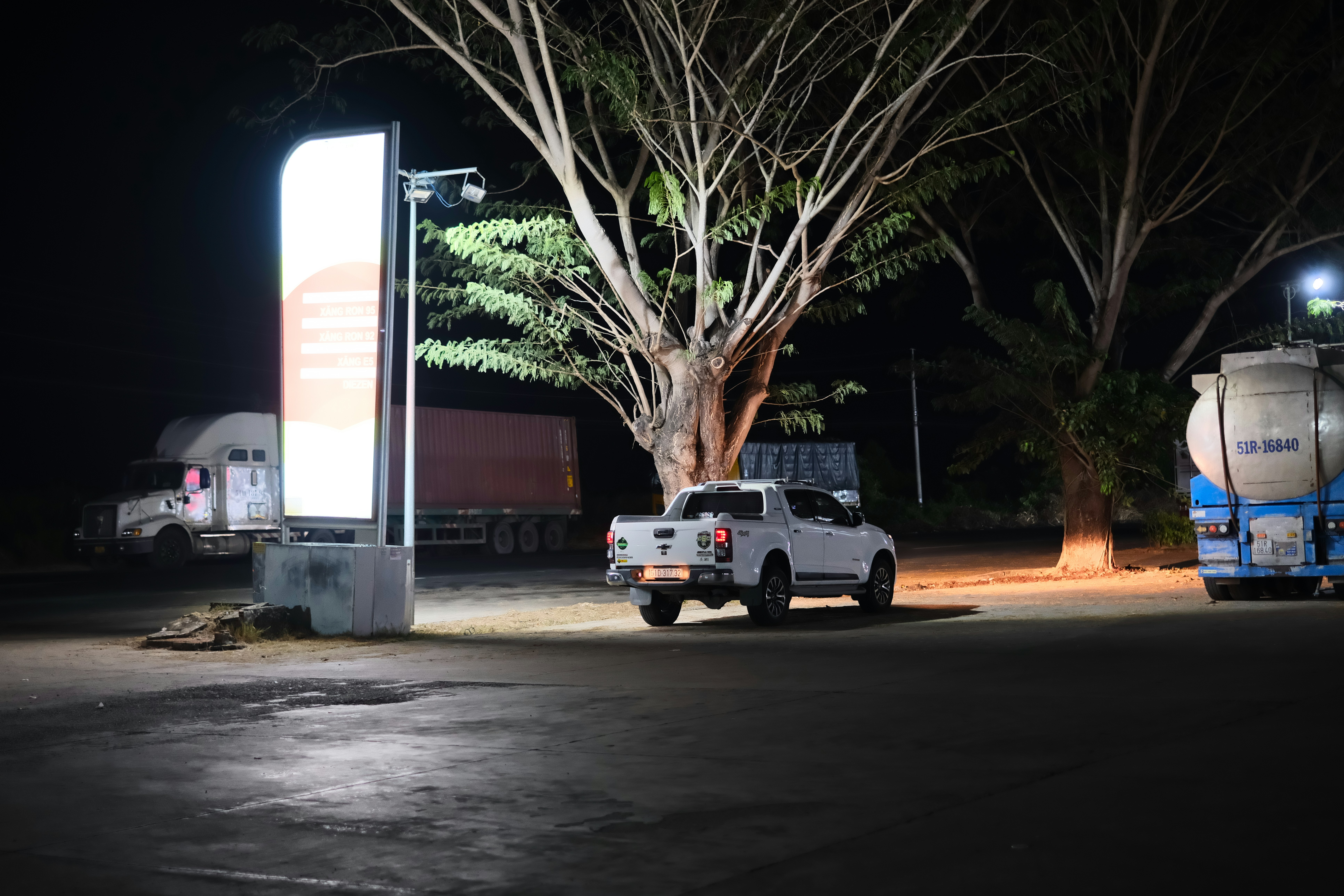 Electric Jeep SUV plugged in at a public fast charging station