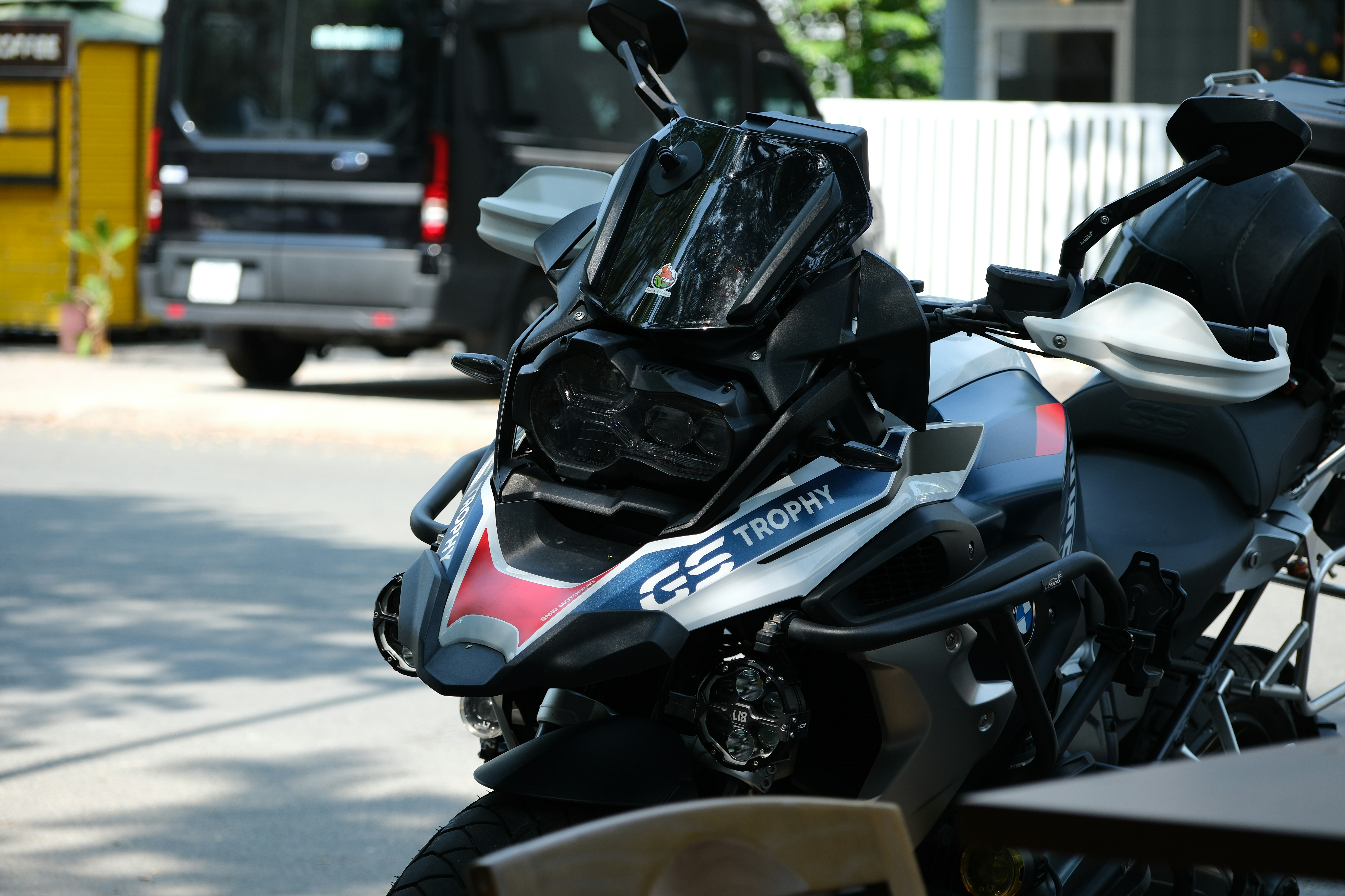 A motorcycle parked on the side of the road