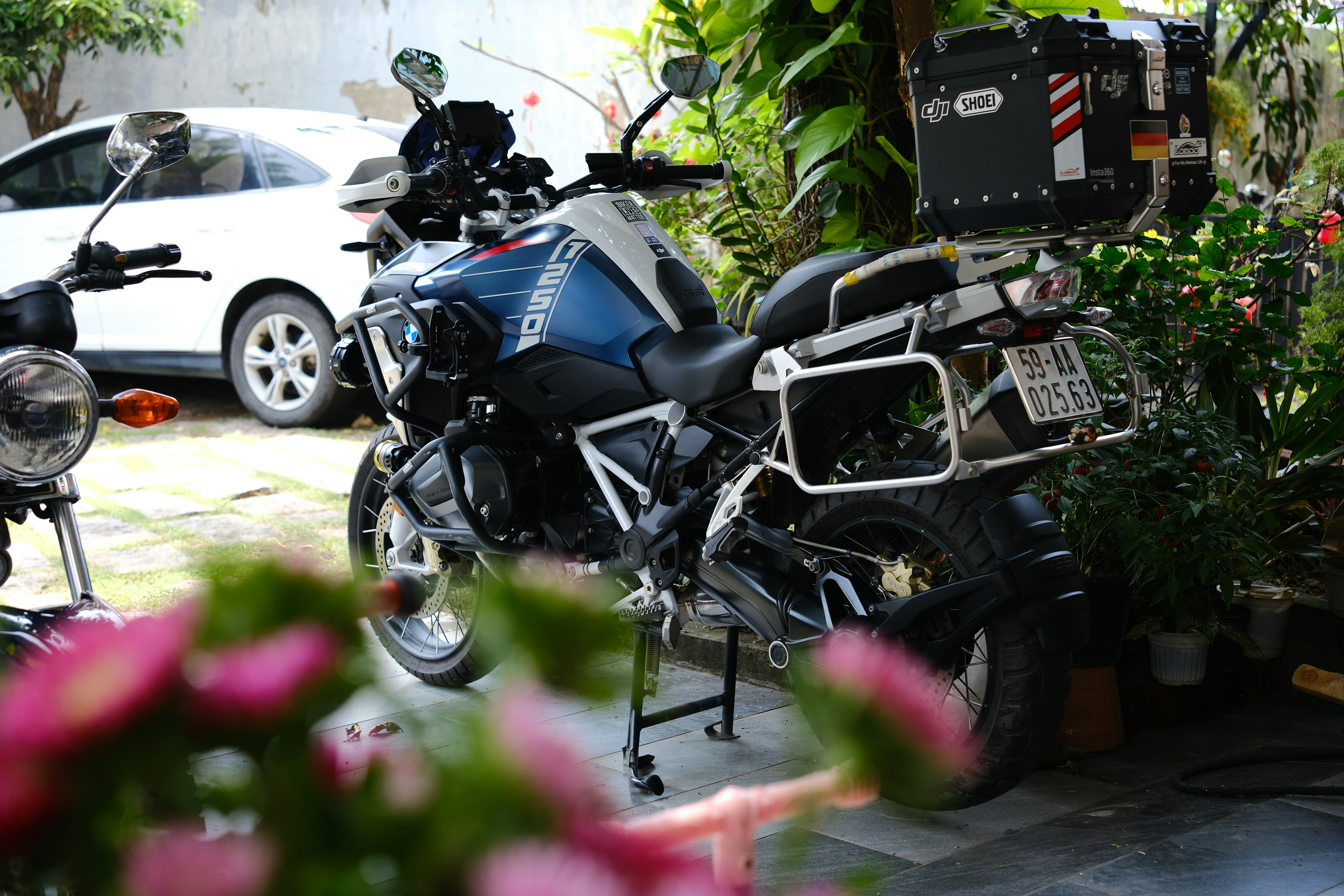 A couple of motorcycles parked next to each other