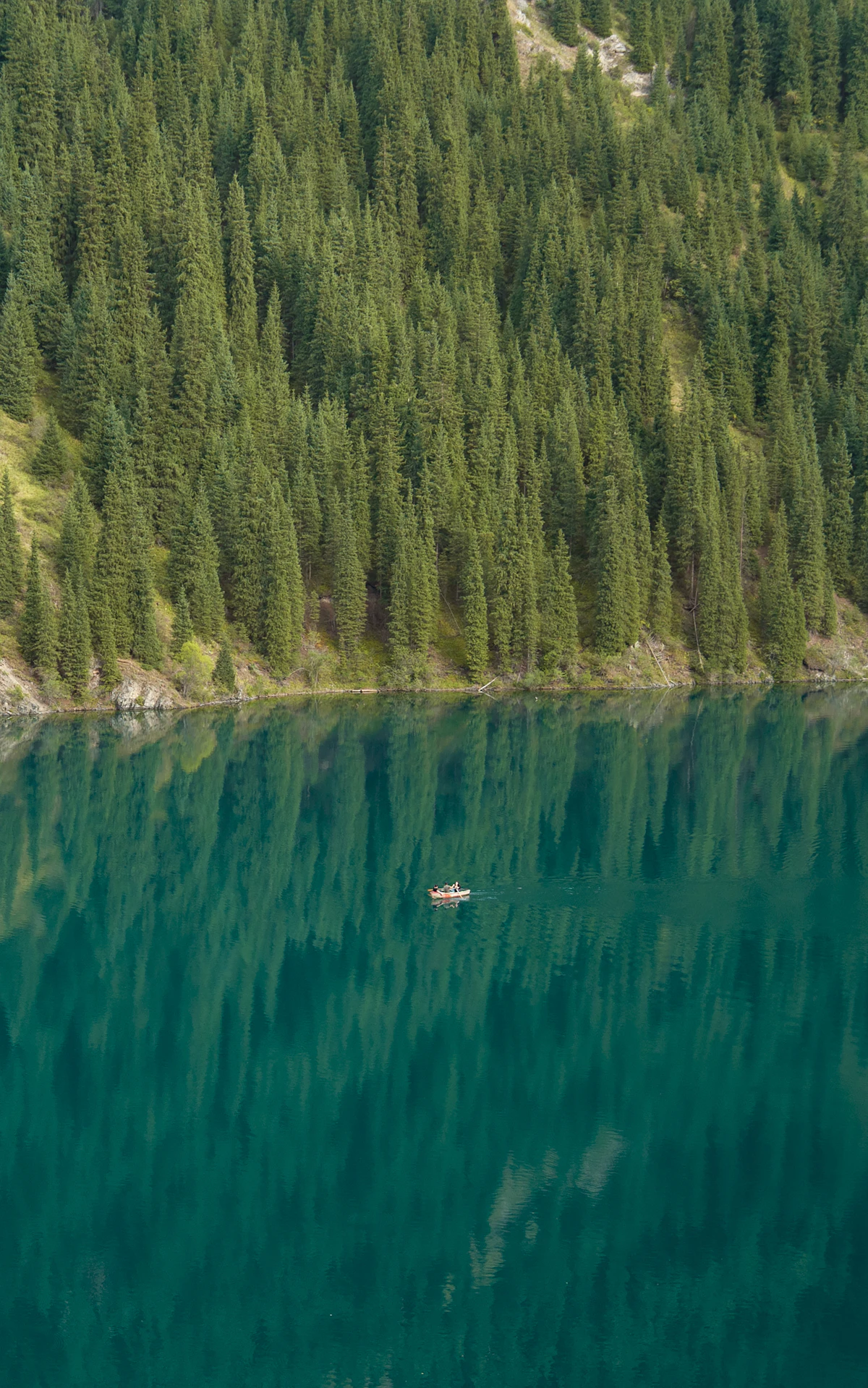 Forested mountain lake at Kolsai, Kazakhstan