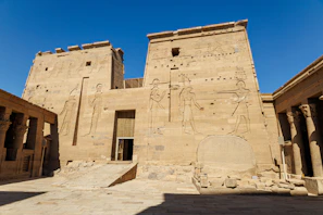 A large building that has a lot of carvings on it
