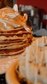 A stack of pancakes sitting on top of a white plate