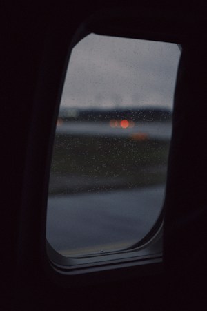 View of an airport runway with a jet on the tarmac, the kind of runway view planned for the outdoor patio on Sunset Road