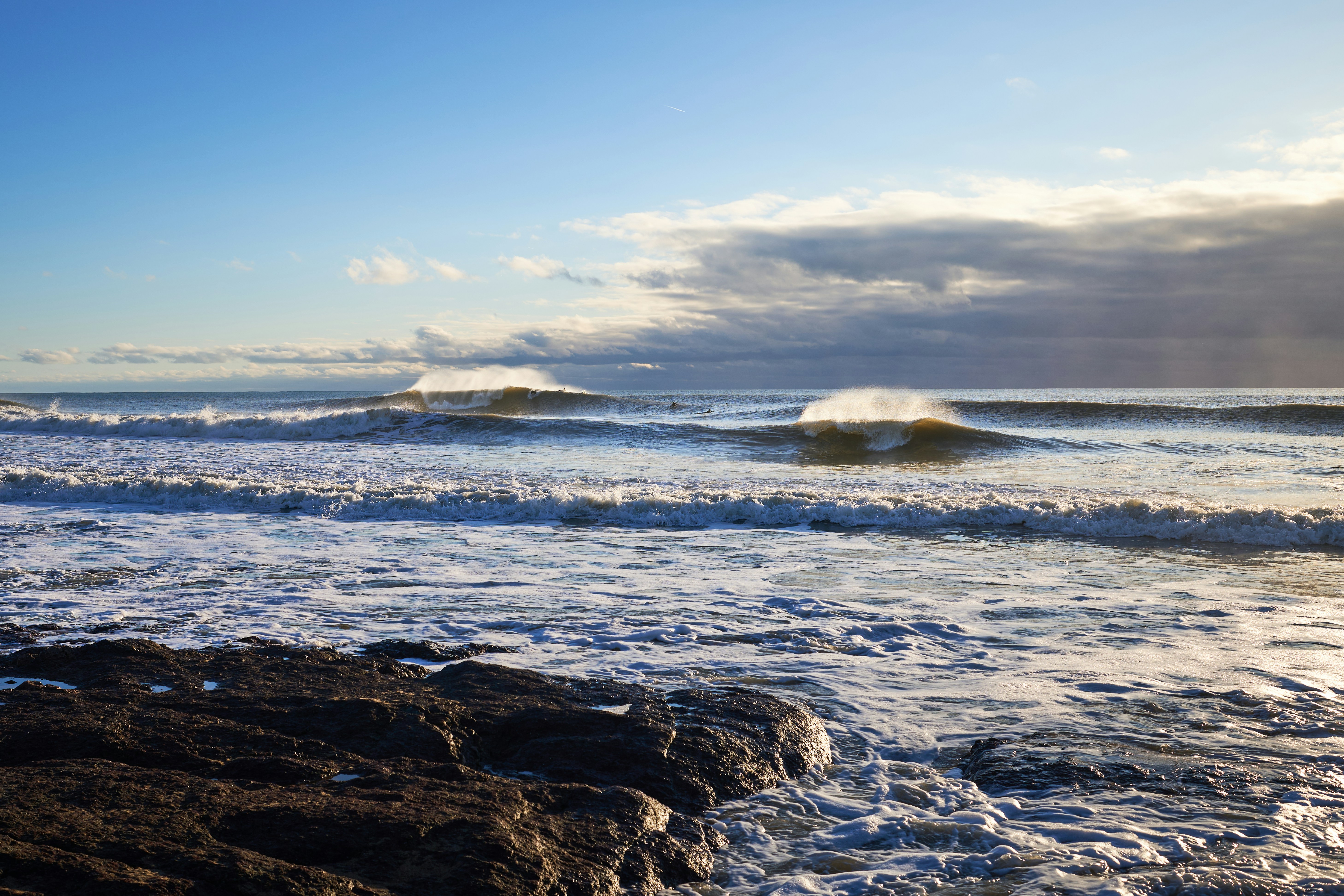 A view of the ocean from a rocky shore