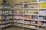 A large metal shelf filled with lots of food
