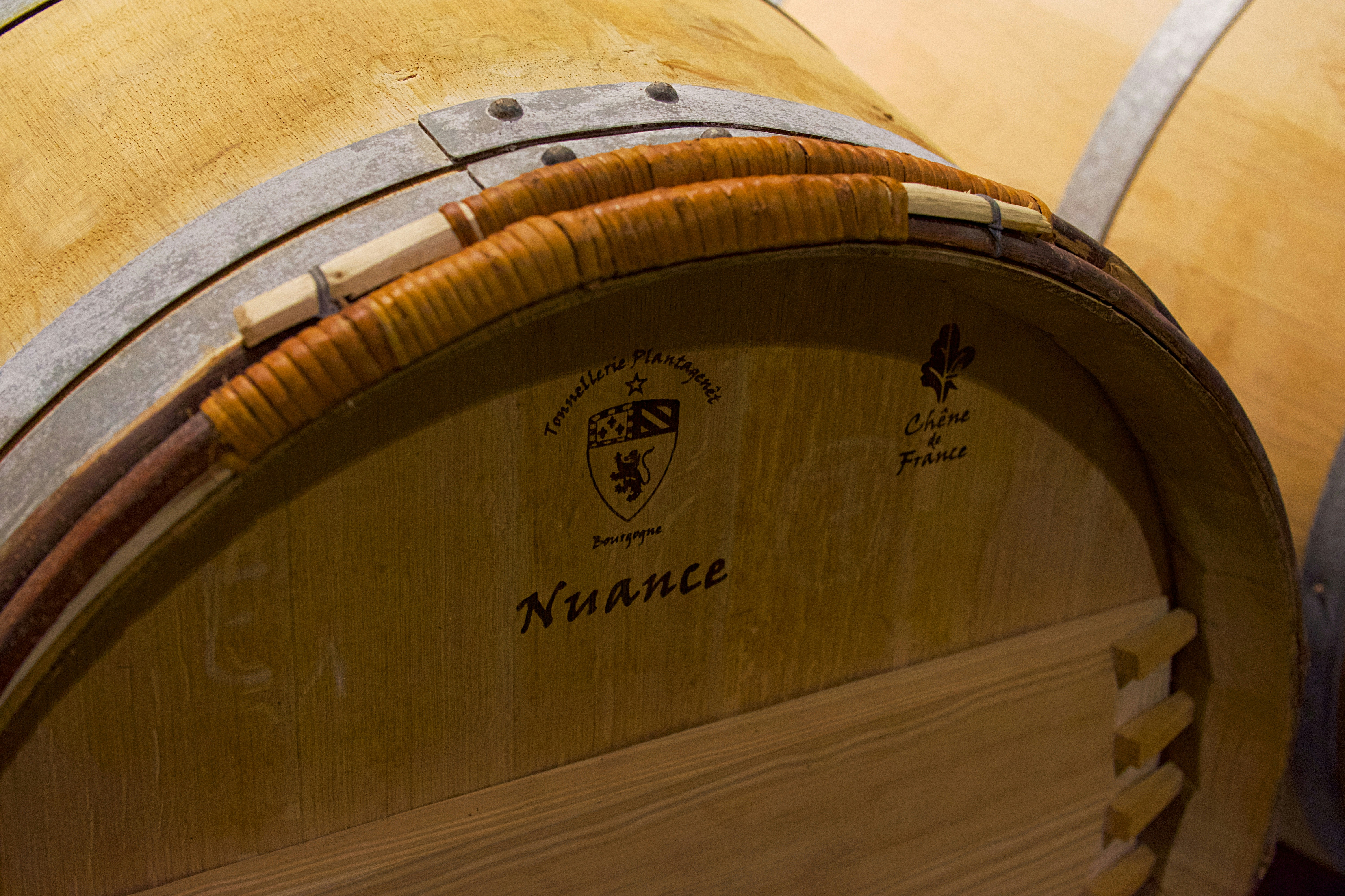 A couple of wooden barrels sitting next to each other