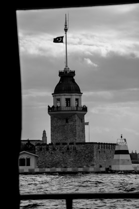 A black and white photo of a lighthouse