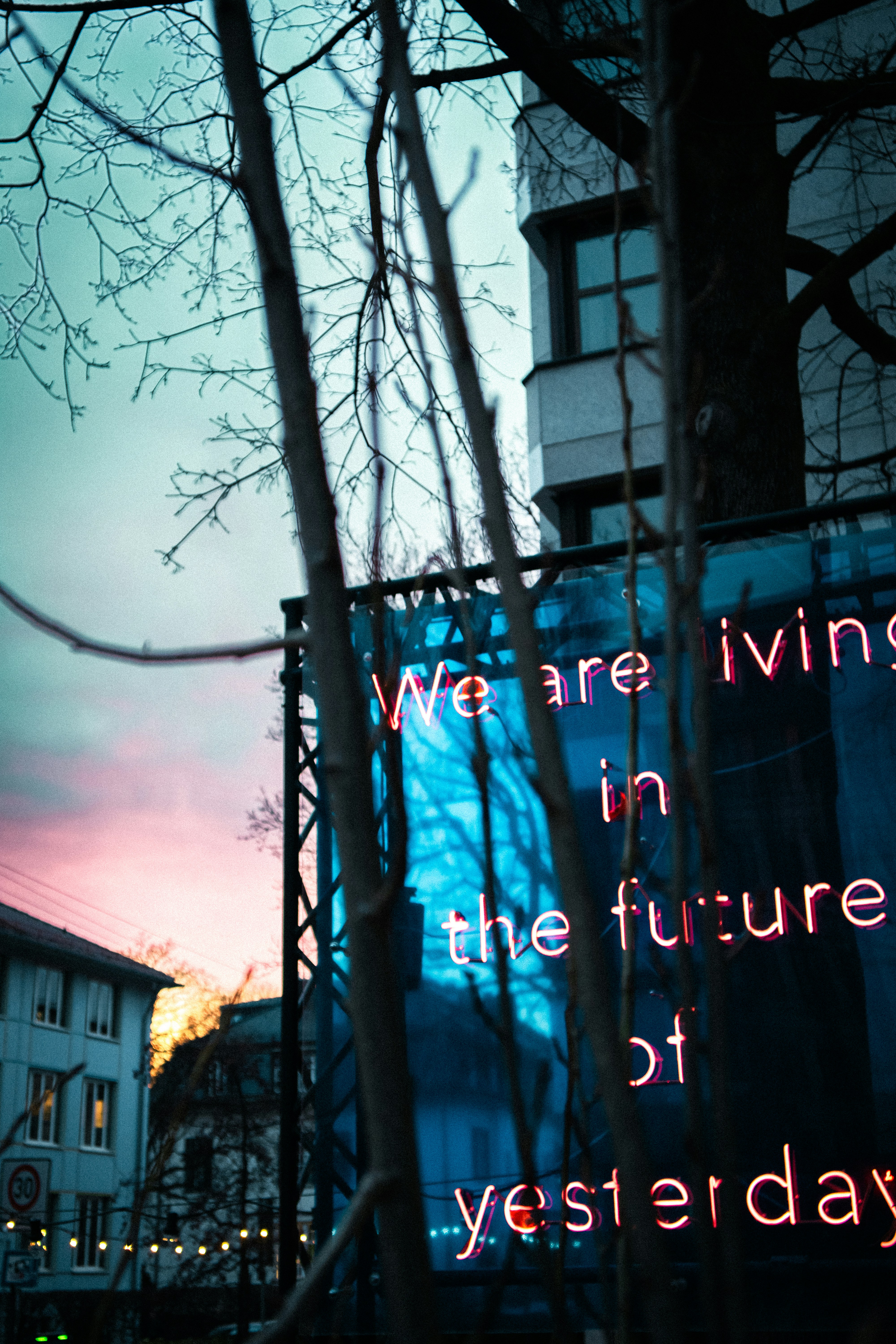 A picture of a sign that says we are living in the future of yestery