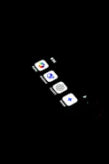A cell phone with several icons on the screen