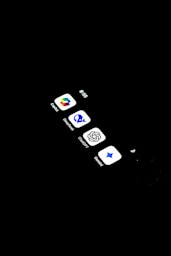 A cell phone with several AI app icons on the screen