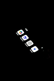 A cell phone with several icons on the screen