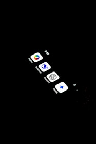 A cell phone with several icons on the screen