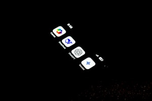 A cell phone that is lit up in the dark