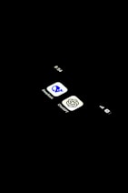 A cell phone is shown in the dark