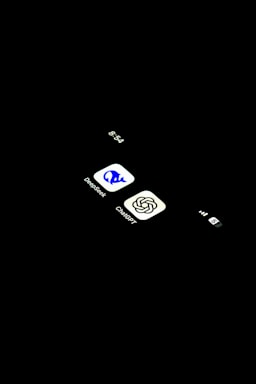 A cell phone is shown in the dark