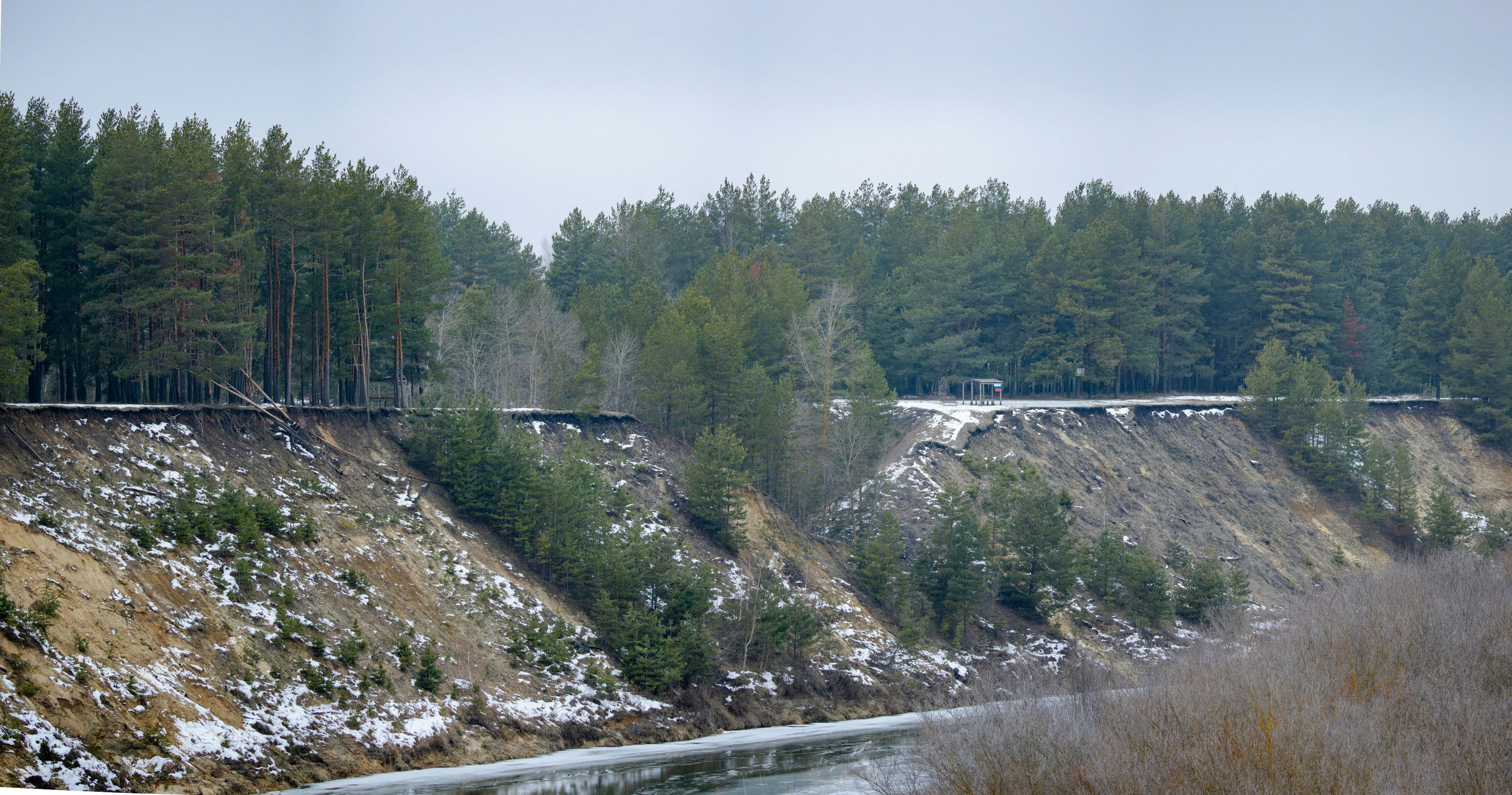 A train traveling over a bridge over a river