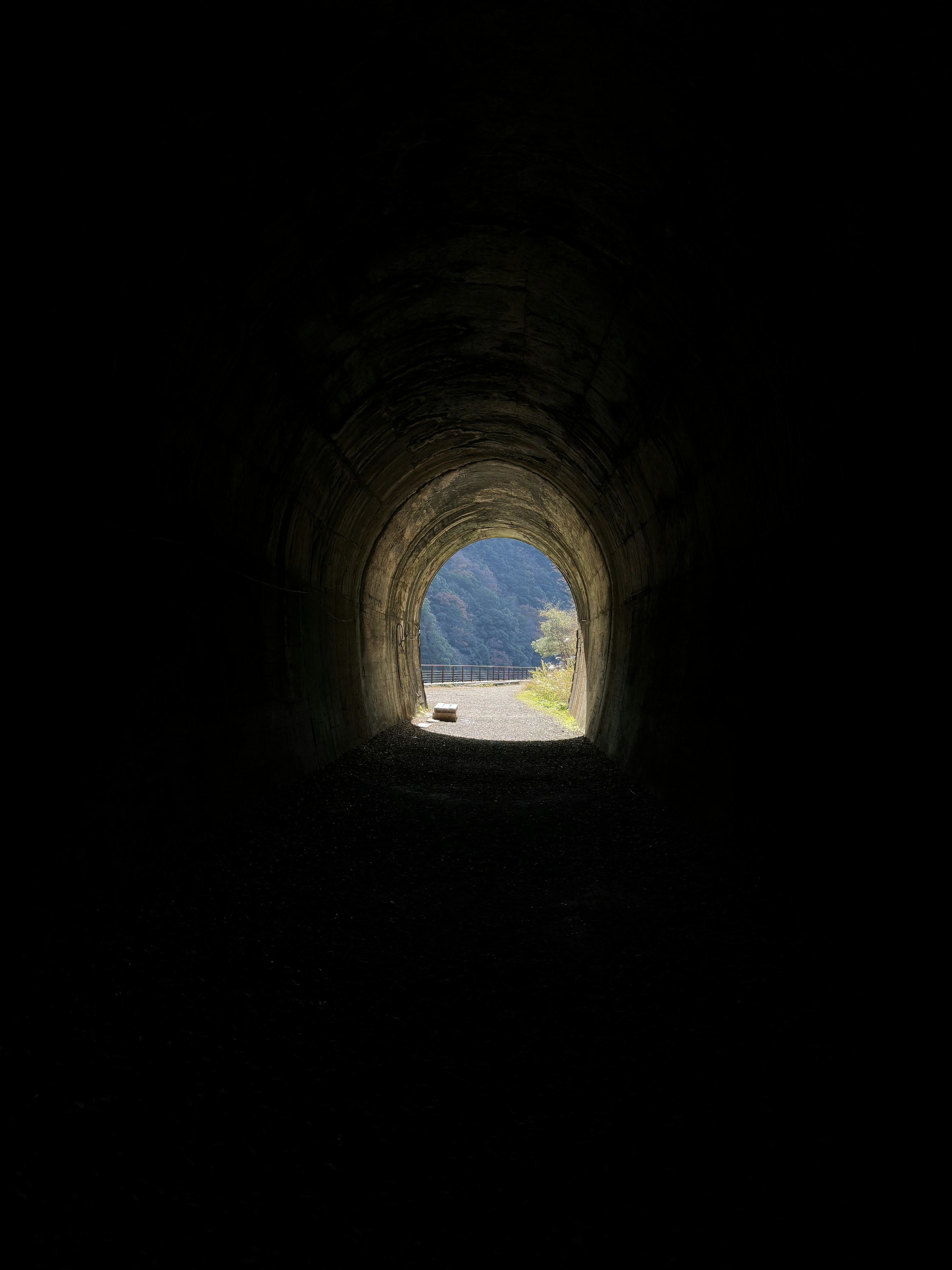 A dark tunnel with a light at the end