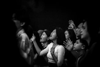 A group of people standing next to each other
