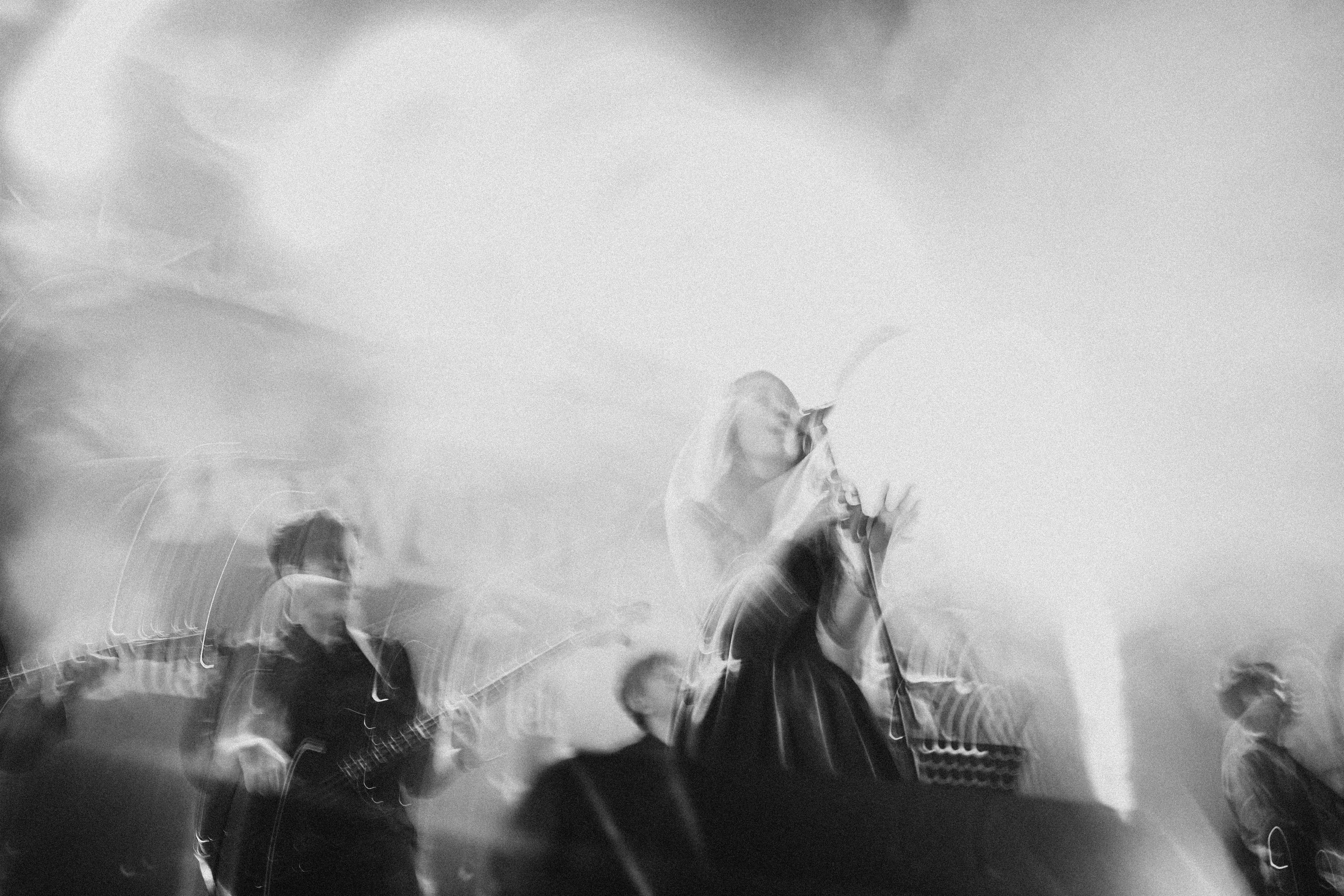 A group of people that are standing on a stage