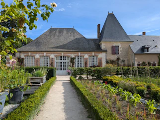 A house with a garden in front of it