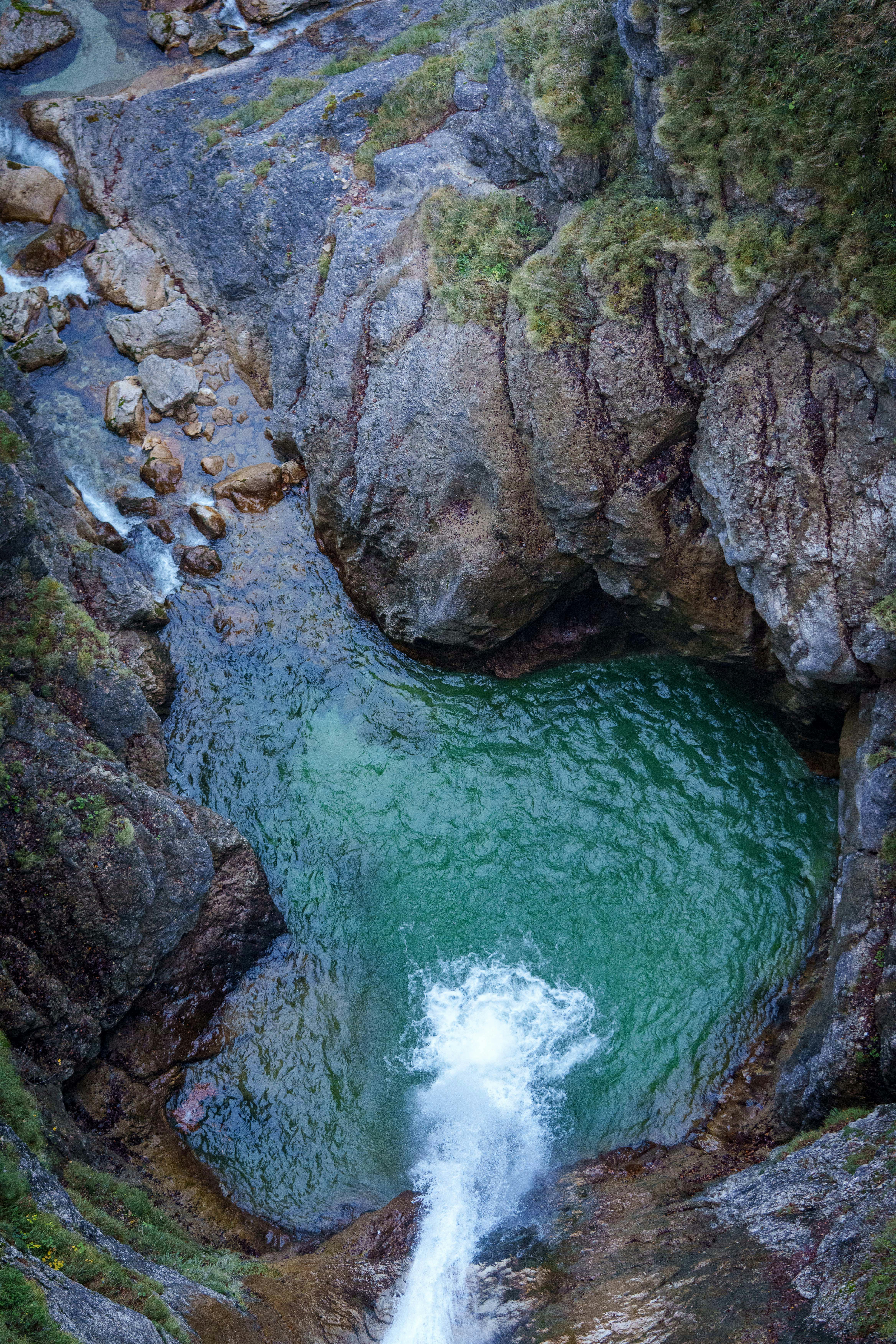 A small waterfall in the middle of some rocks