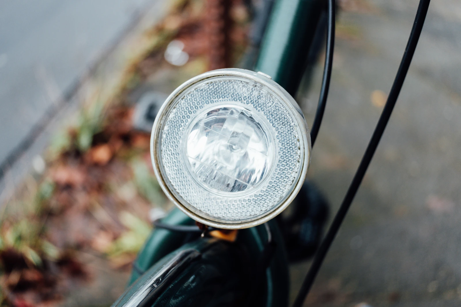 Close view of a bicycle front light mounted on the bike