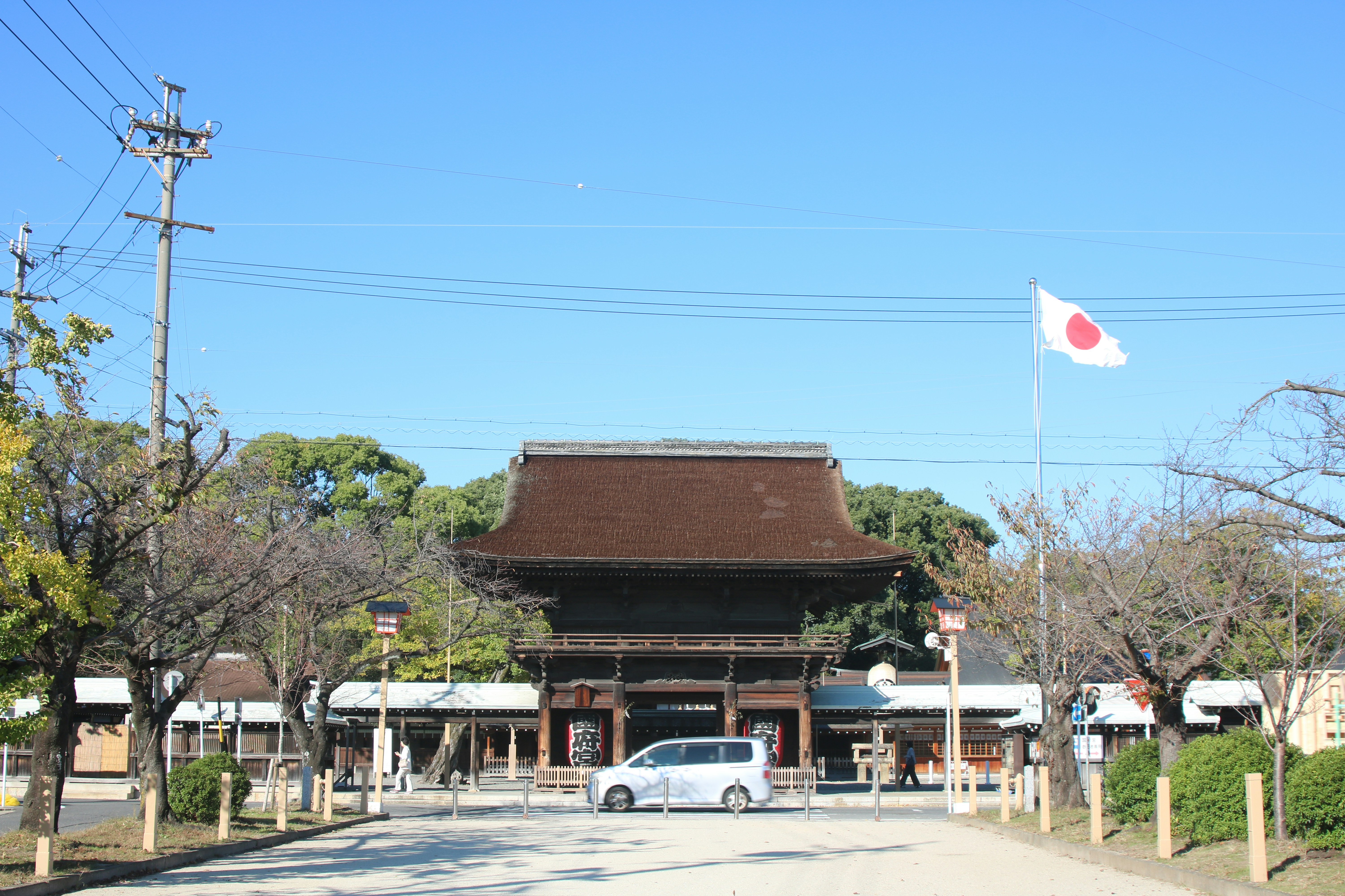 A car is parked in front of a building
