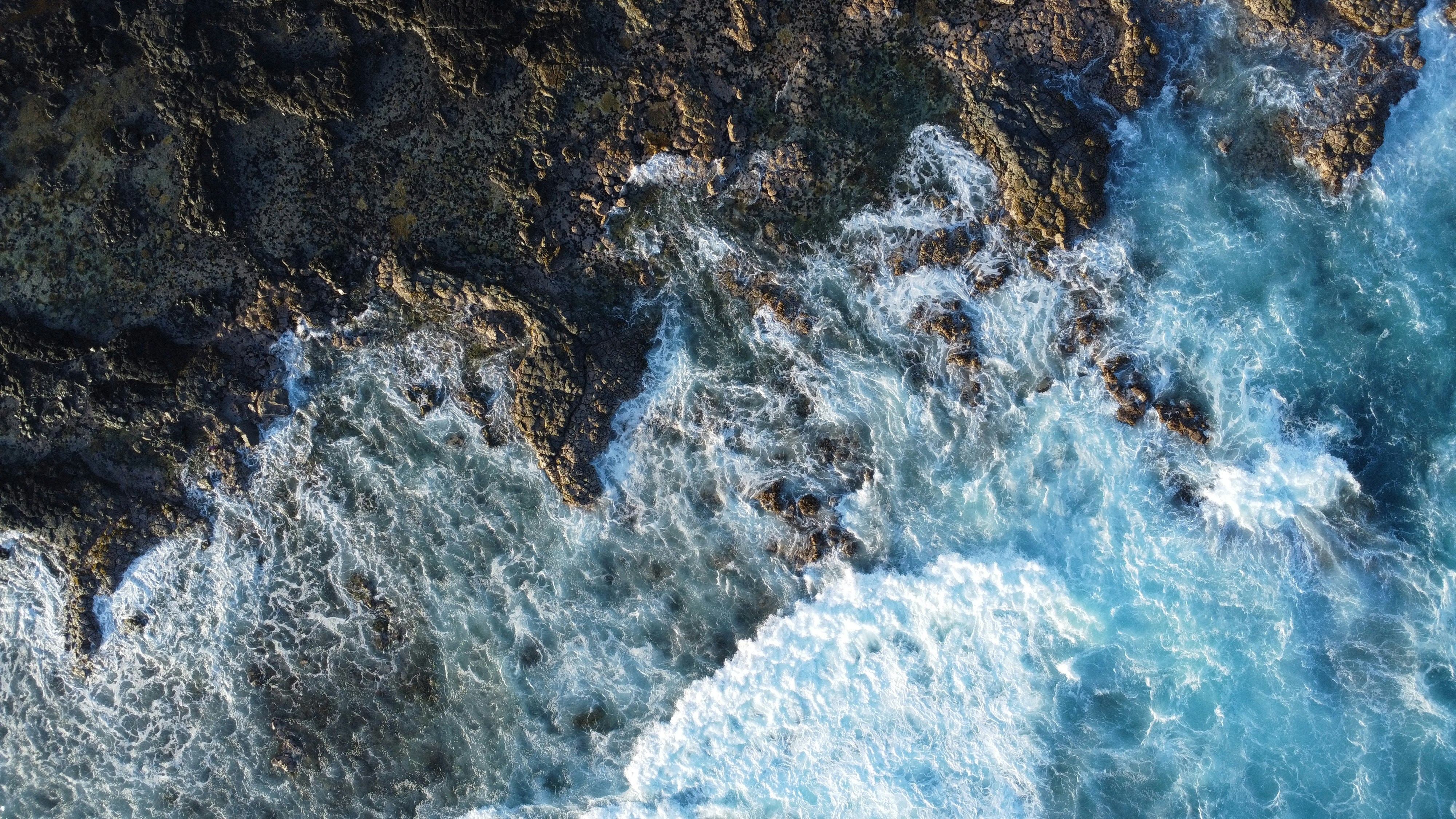 A bird's eye view of the ocean and rocks photo – Free Mauritius Image ...