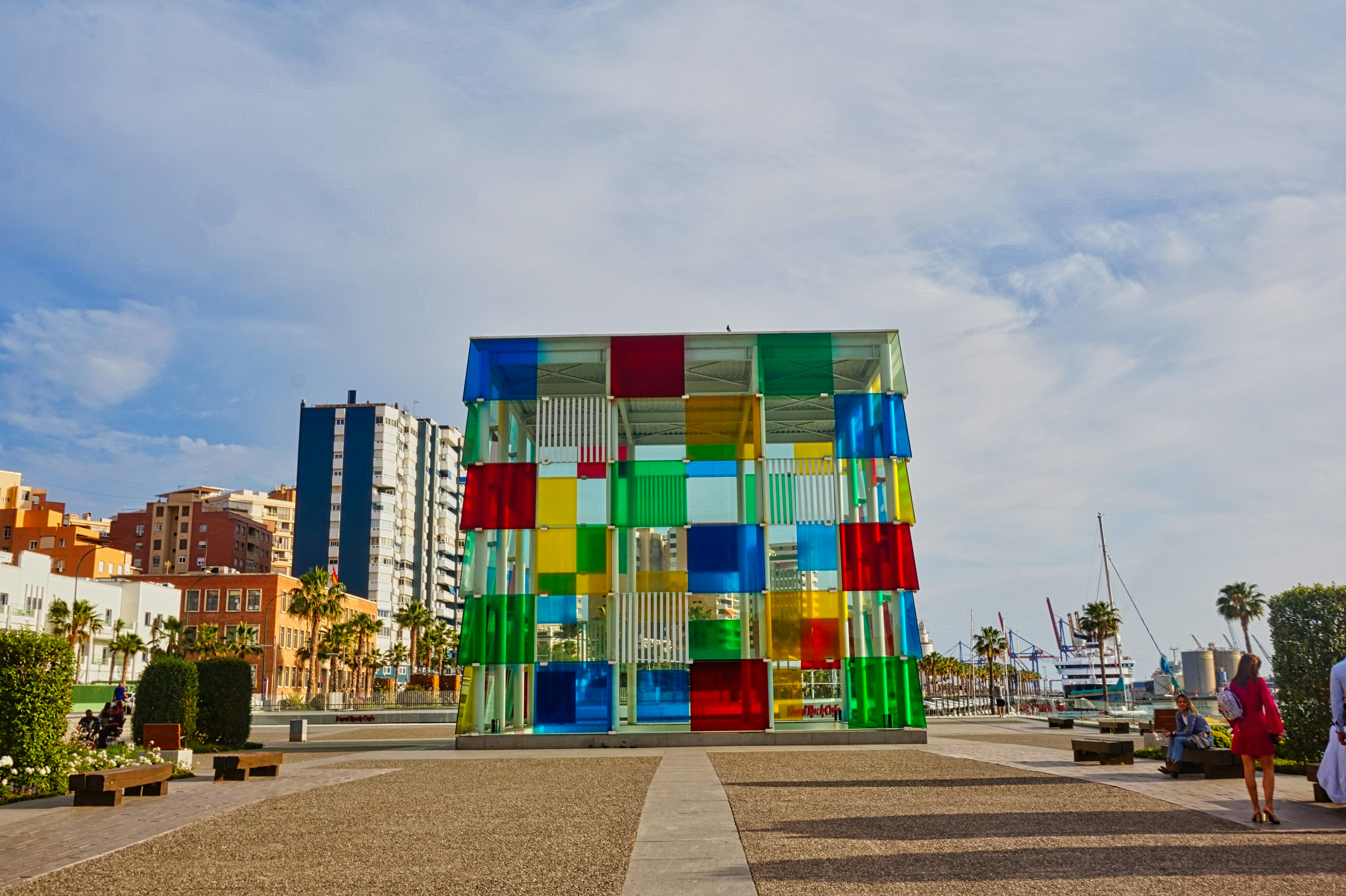 The multicoloured glass cube of the Centre Pompidou Málaga at the port