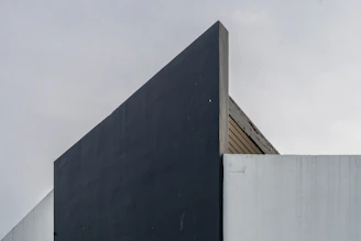 A tall building with a clock on the side of it