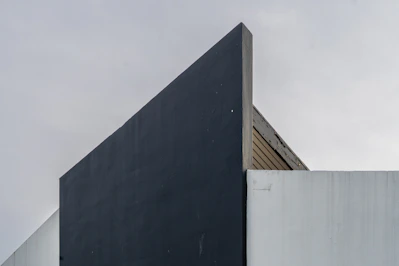 A tall building with a clock on the side of it