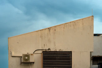 A building with a sign on the side of it