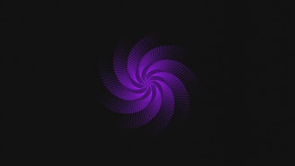 A purple swirl on a black background