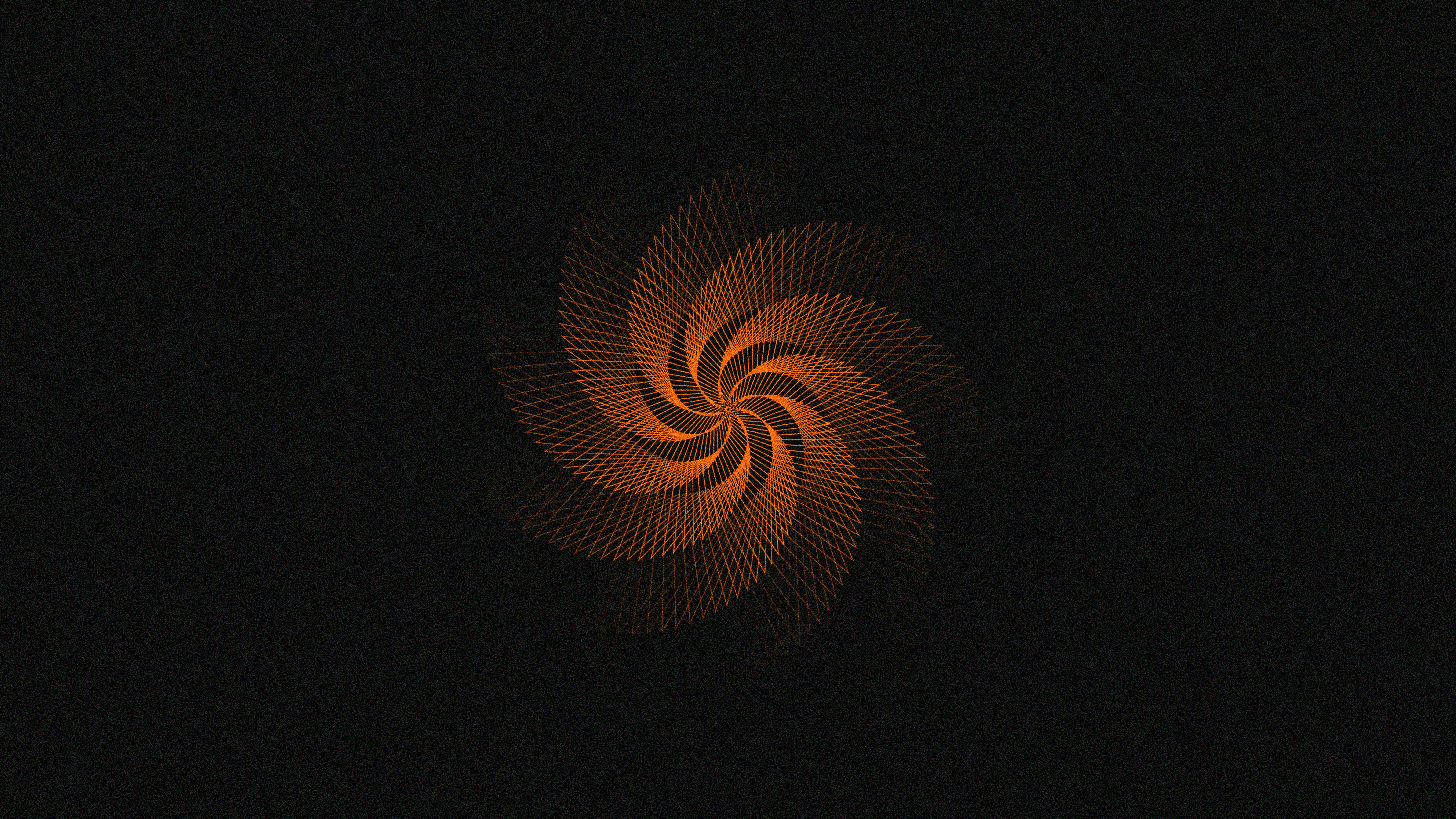 A black background with an orange swirl