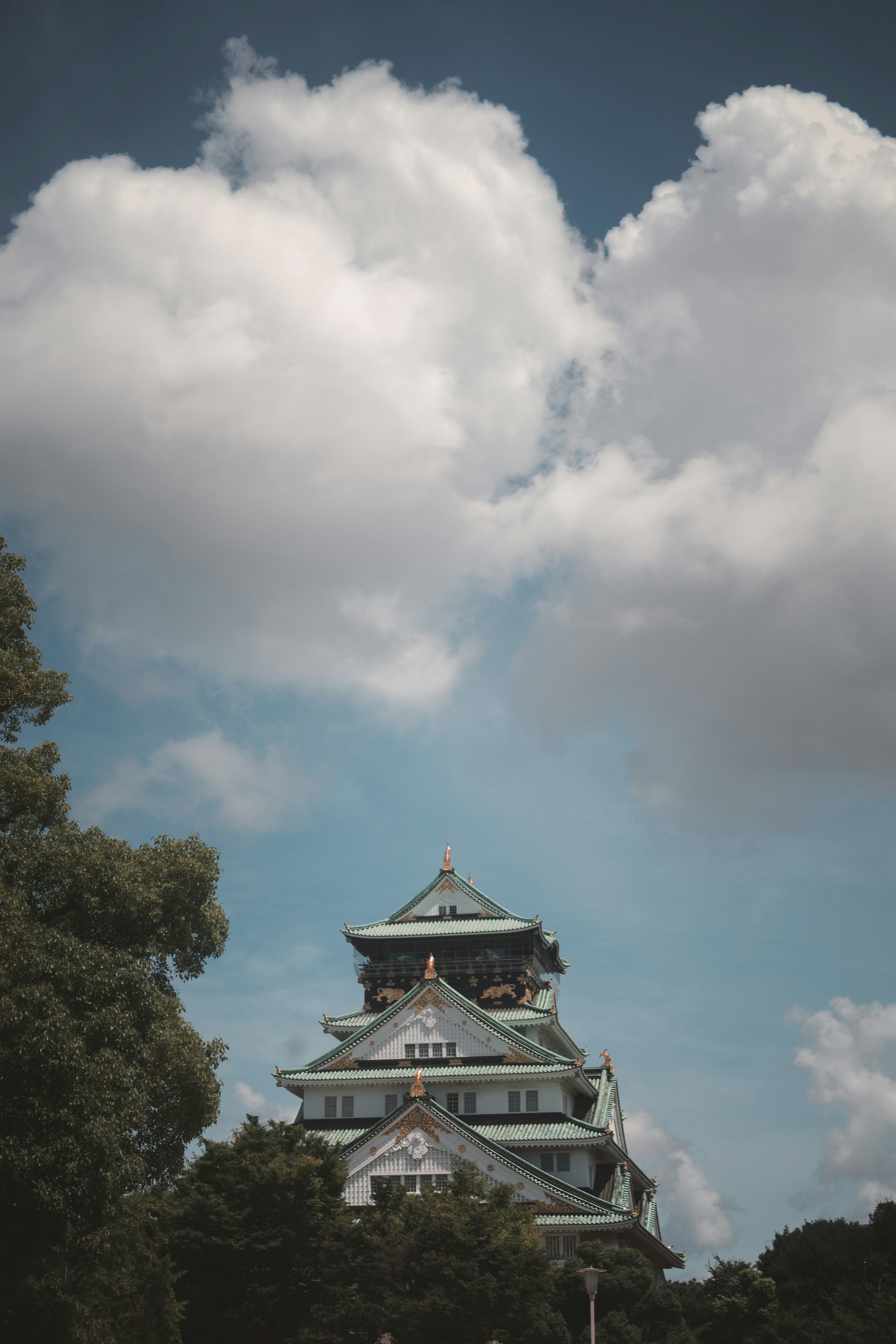 A tall building with a clock on the top of it