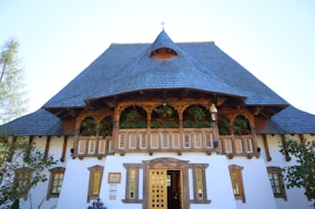 A large white building with a blue roof