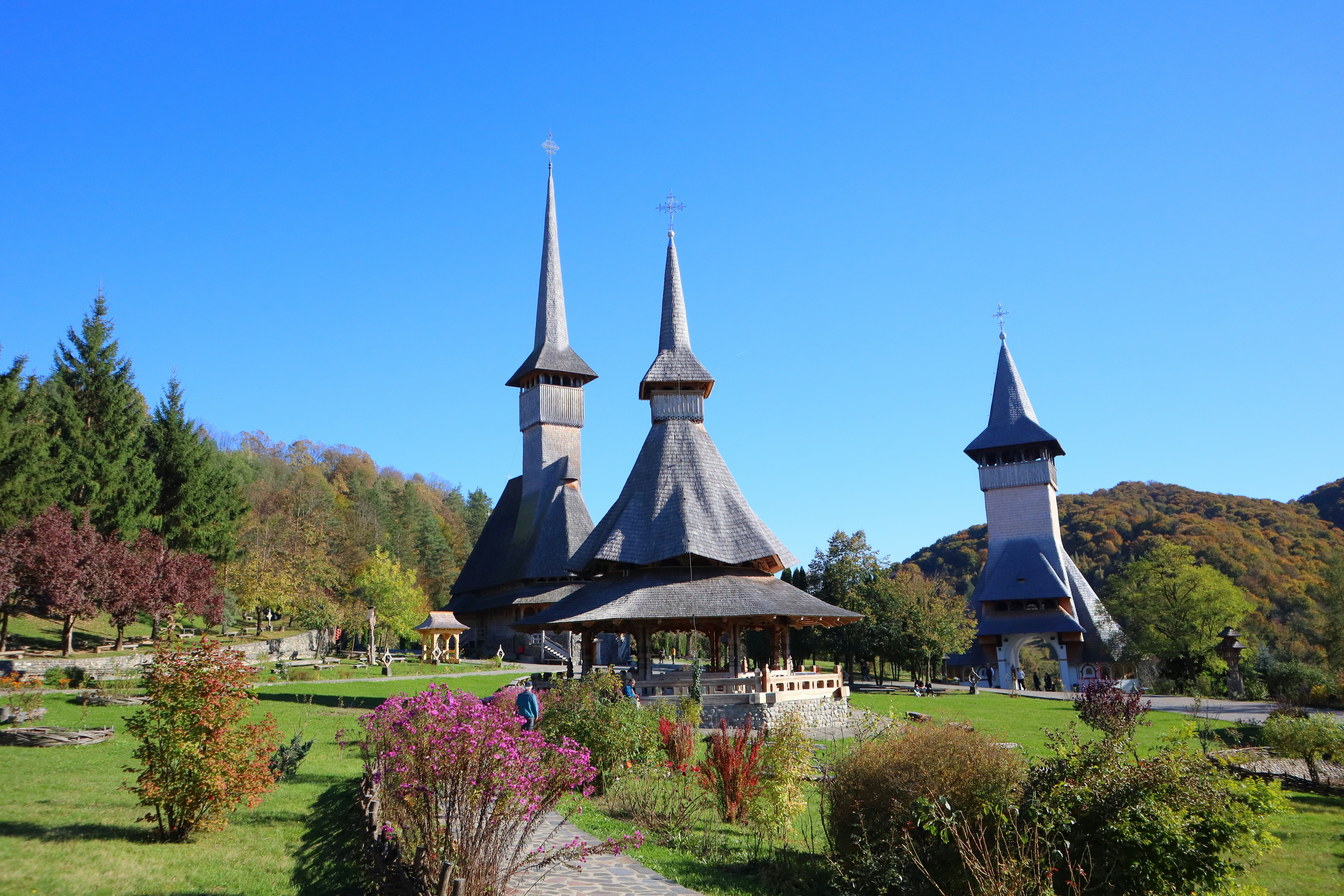 A large building with three spires on top of it