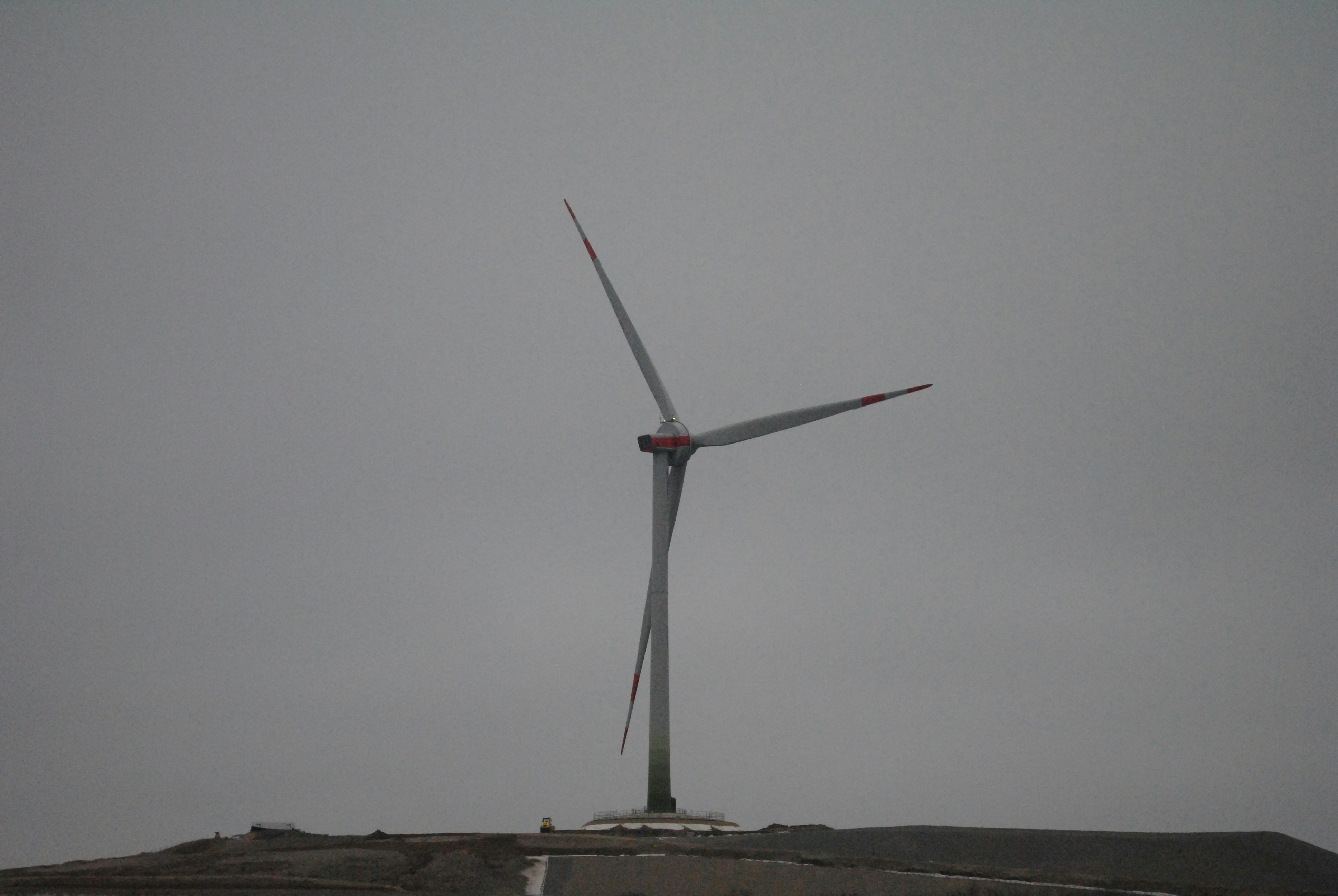 A wind turbine on top of a building
