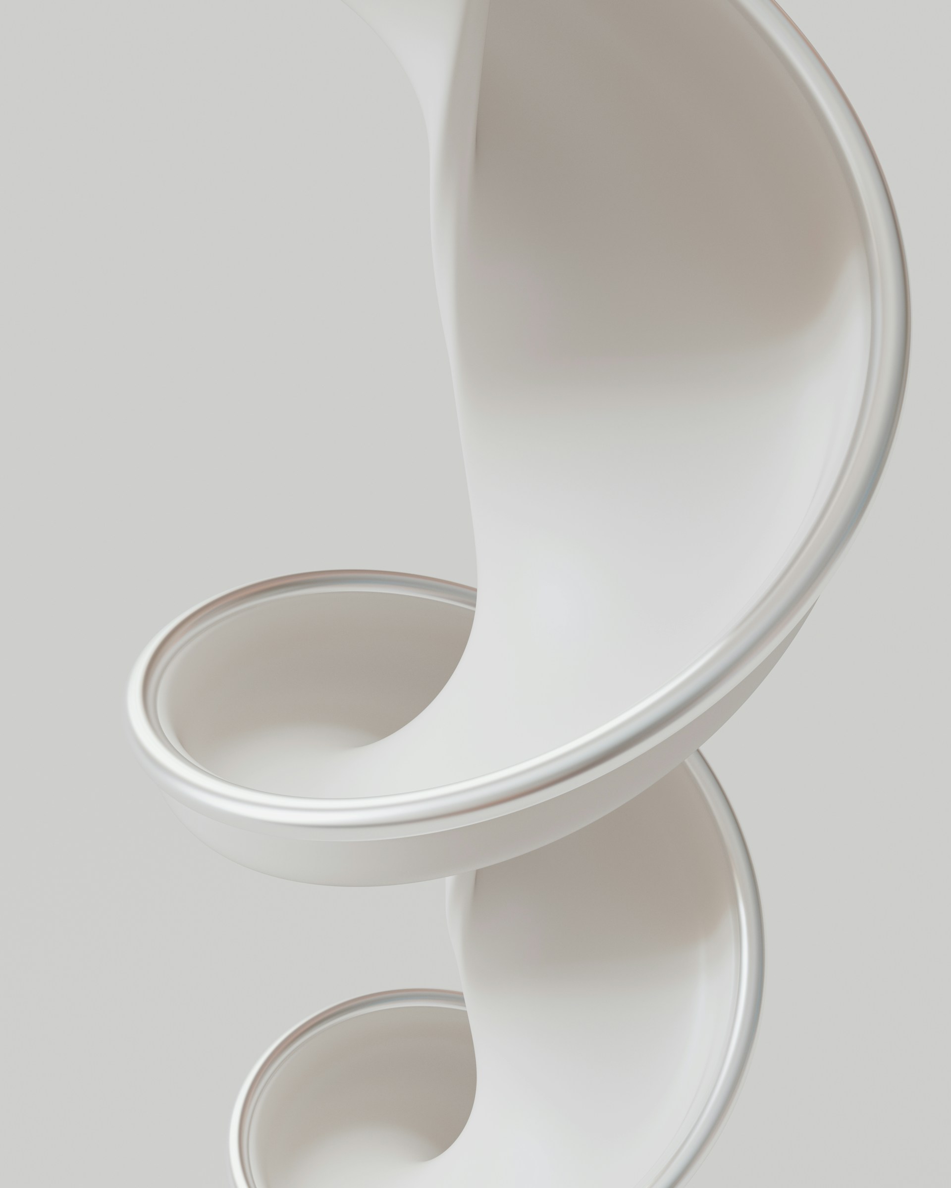 A white vase sitting on top of a table