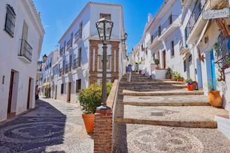 A street with a bunch of white buildings