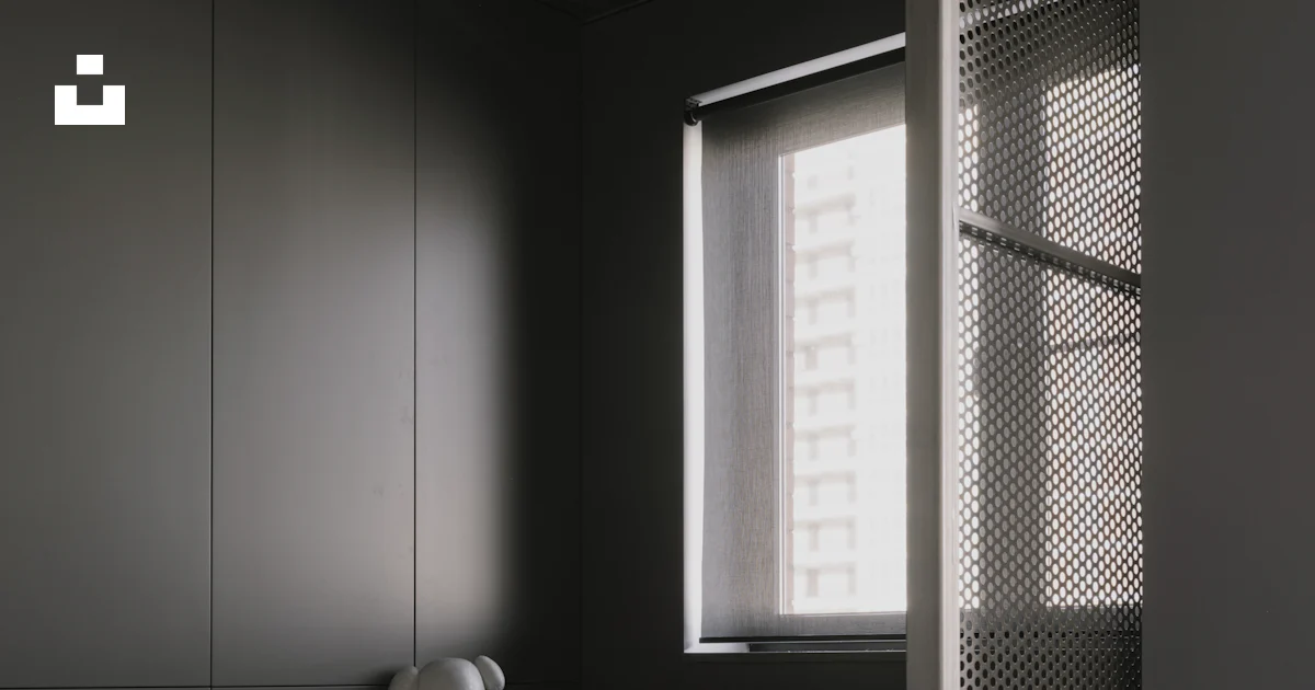 A room with a couch and a window photo – Free Architecture Image on ...