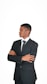 A man in a suit with his arms crossed