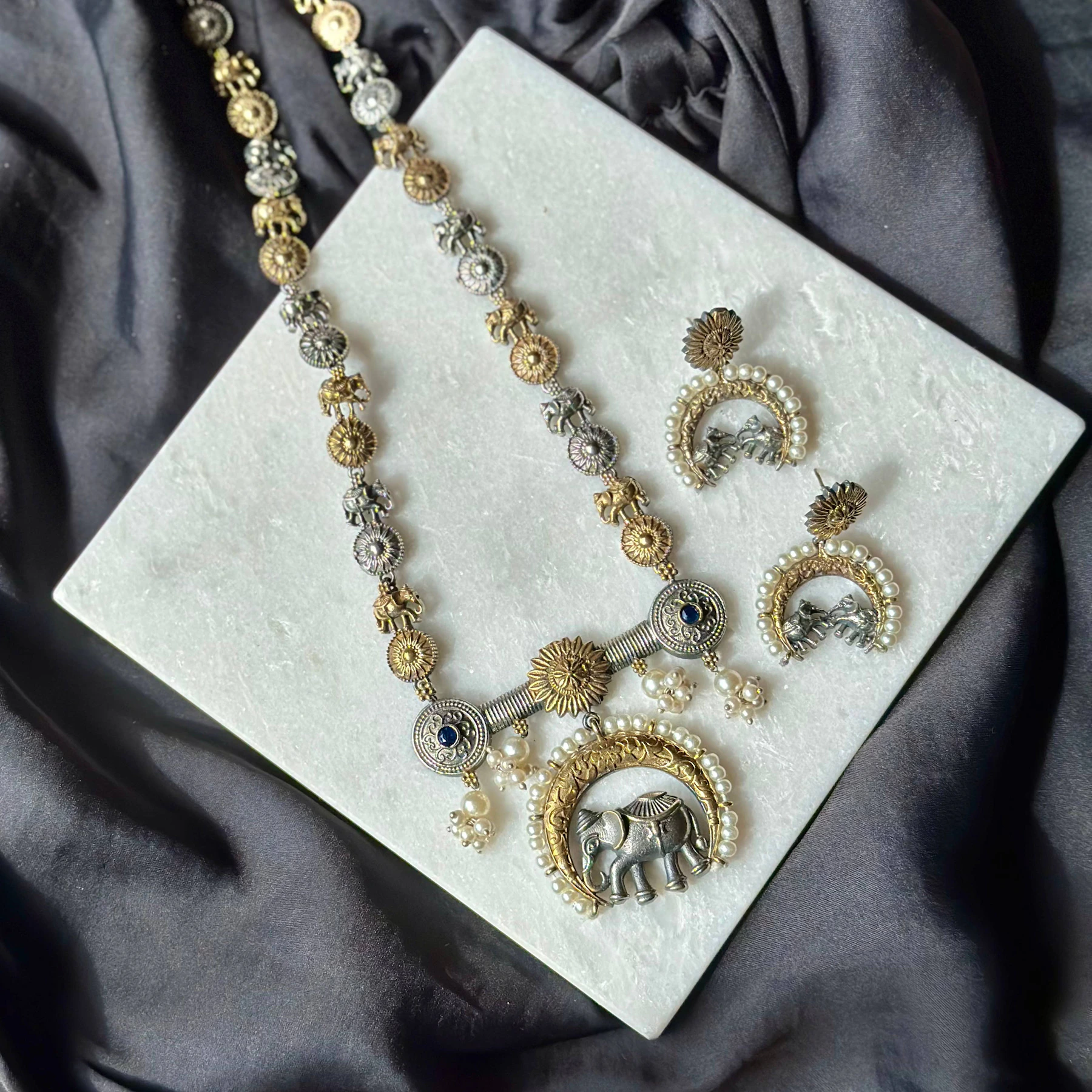 Silver necklace and earring set